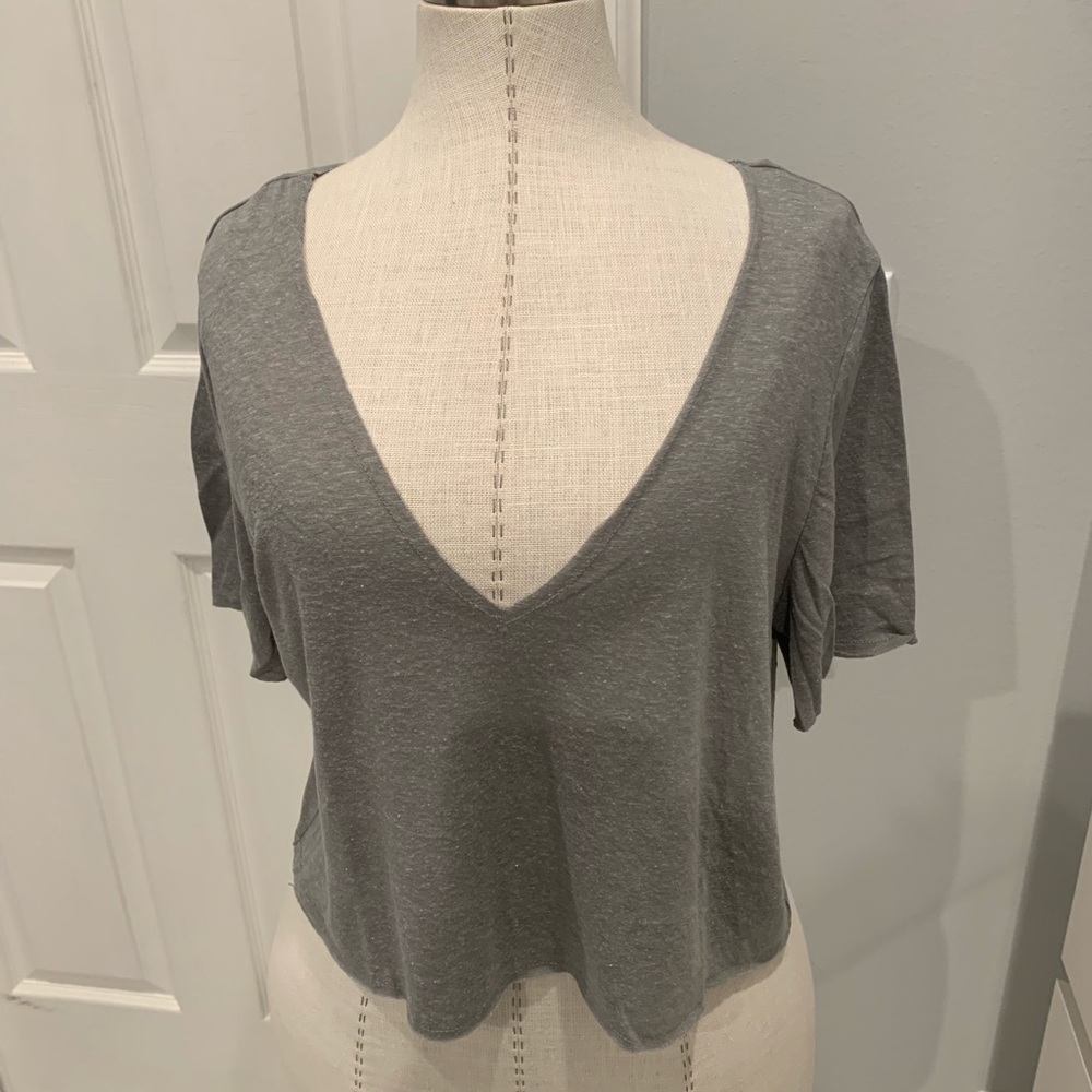 grey V-neck top